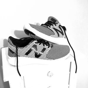 New Balance- New size 2 shoe